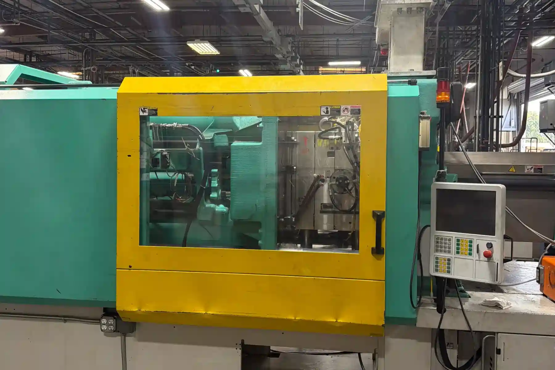 How Does Custom Injection Molding Improve Product Design